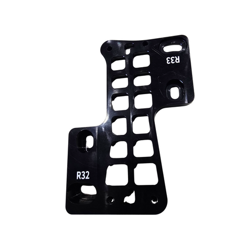 A black anodized aluminum plate or bracket with multiple cutouts and white stamped alphanumeric markings 'R32' and 'R33', shown on a plain white background.