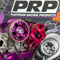 Close-up of purple and red engine components with PRP Platinum Racing Products branding in the background.