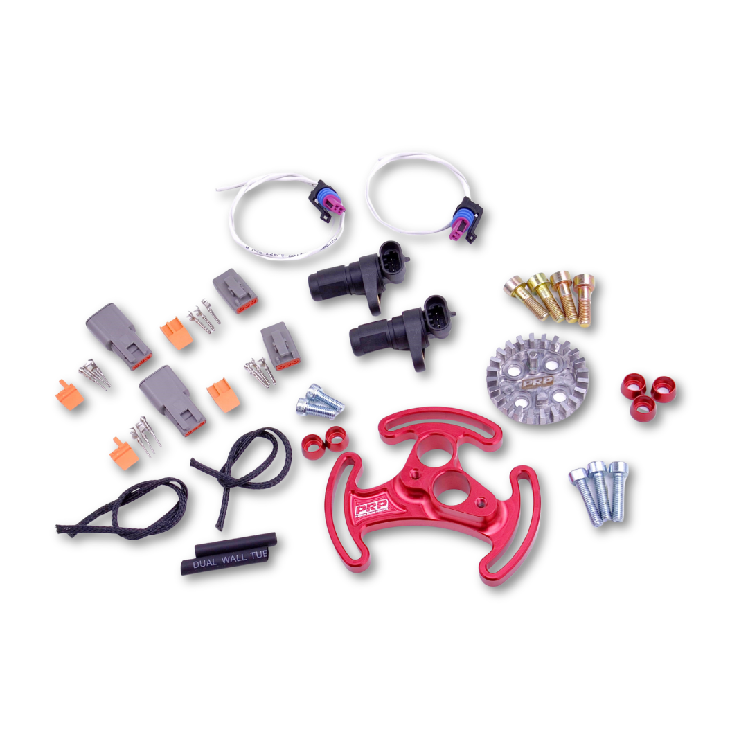 Collection of mechanical parts and tools on a white background