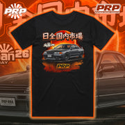 Black t-shirt with car graphic and PRP logo on an orange and brown background