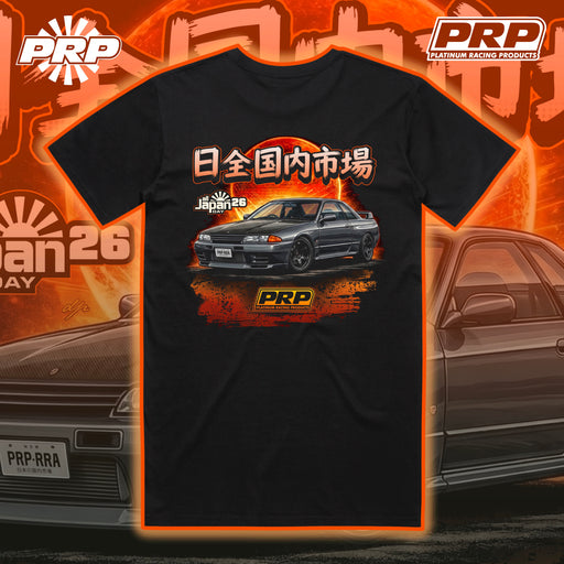 Black t-shirt with car graphic and PRP logo on an orange and brown background