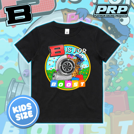 A black kids' short-sleeve T-shirt with a colorful turbocharger and 'B IS FOR BOOST' graphic, shown on a playful light blue background with PRP branding and a 'KIDS SIZE' badge.