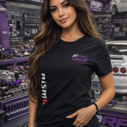 Woman wearing a black t-shirt with NISMO logo in a car parts store.