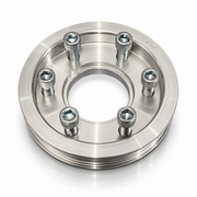 A polished steel wheel spacer with six threaded lug bolts, shown on a clean white background with a subtle reflection.